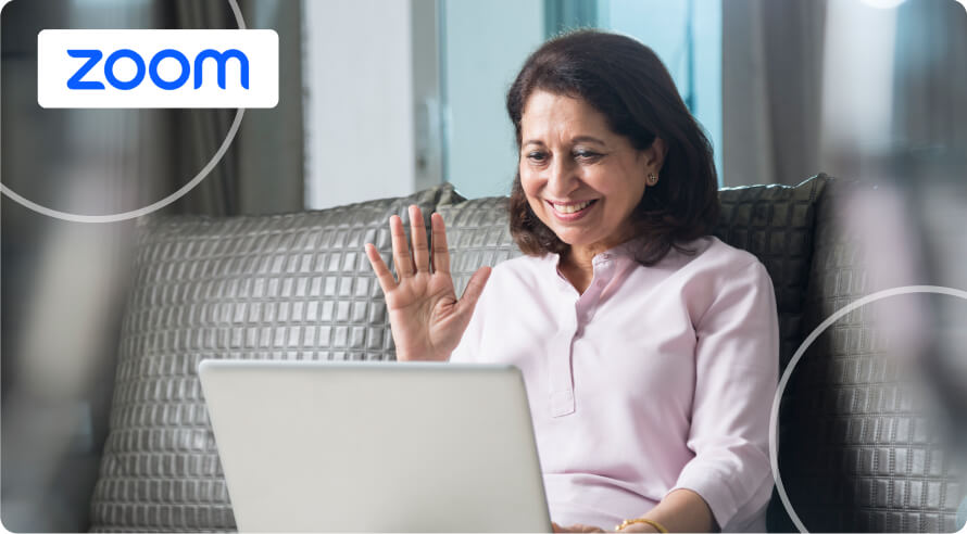 a woman looking at a laptop